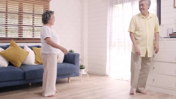 Asian Elderly Couple Dancing Together While Listen Music Living Room — Stock Video