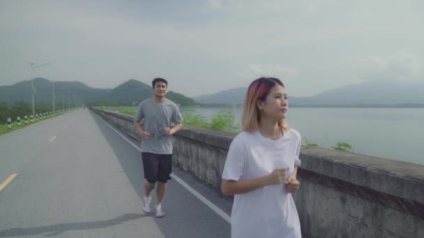 Mouvement Lent Couple Coureur Asiatique Courir Faire Jogging Dans Rue — Video