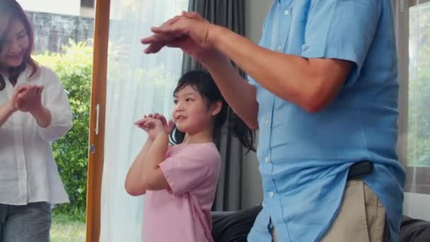 Asian Grandparents Granddaughter Listen Music Dance Together Home Senior Chinese — Stock Video