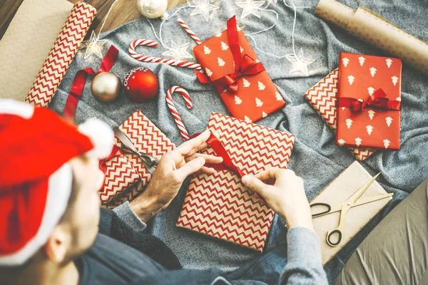 Cropped Shot Man Wrapping Presents Christmas Bed — Stock Photo, Image