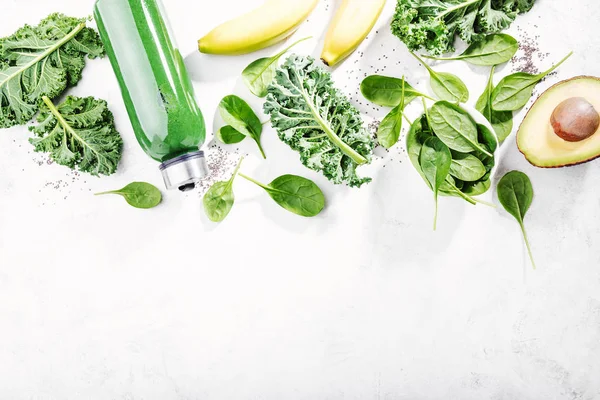 Top View Green Smoothie Bottle Lettuce Avocado Bananas White Table — Stock Photo, Image