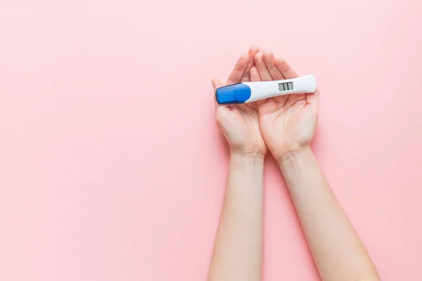 Closeup Female Hands Holding Positive Pregnancy Test Two Stripes Pink — Φωτογραφία Αρχείου