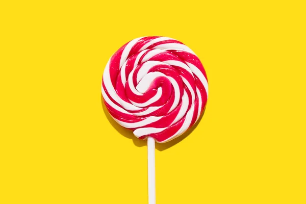 Colorful Funny Appetizing Lollypop Swirl Candy Stick Yellow Background — Stock Photo, Image