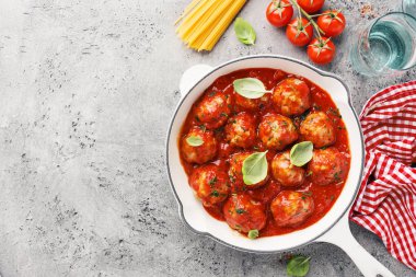 Homemade meatballs with tomato sauce clipart