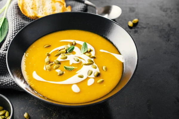 Pumpkin creamy soup served in bowl — Stock Photo, Image