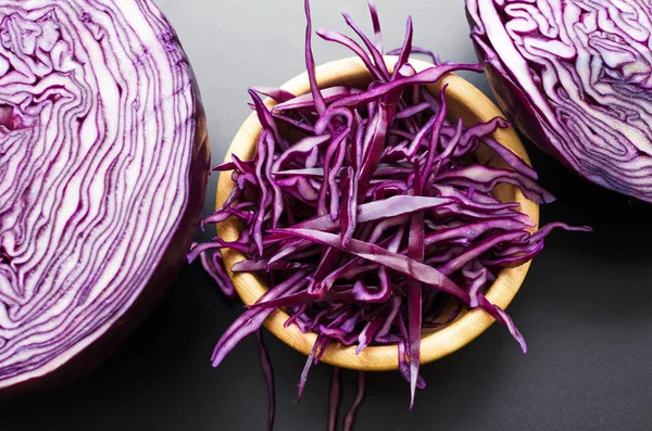 chopped red cabbage salad in wooden bowl