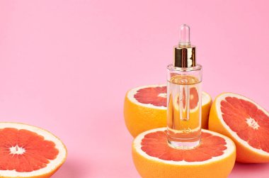 Taze greyfurt dilimli turunçgil yağı. Aromaterapi.