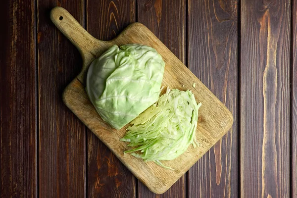 Shredded White Cabbage Salad Wooden Cutting Board Dark Wooden Background — Stock Photo, Image