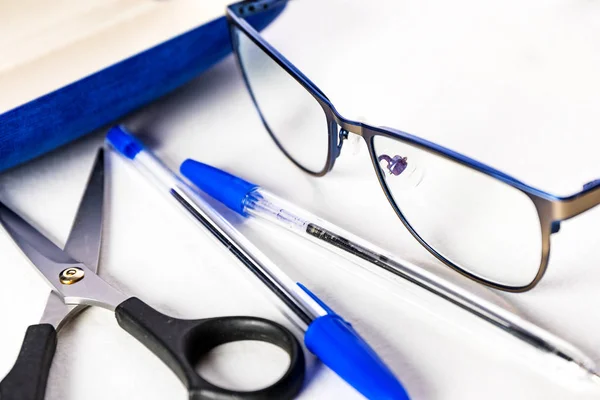 Stationery Glasses Pens Scissors White Background — Stock Photo, Image