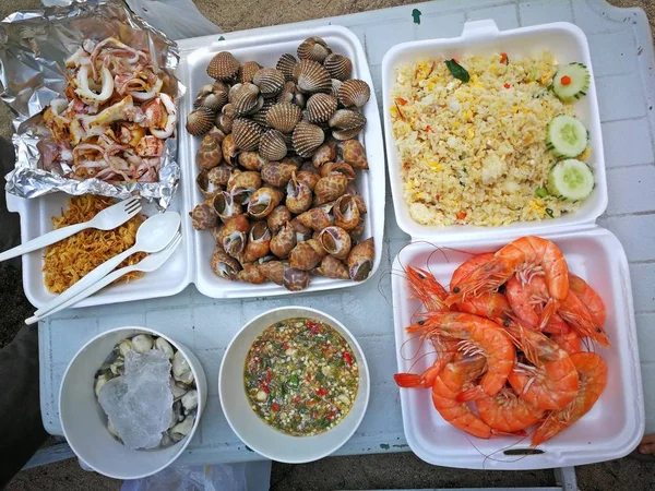 seafood barbecue on beach