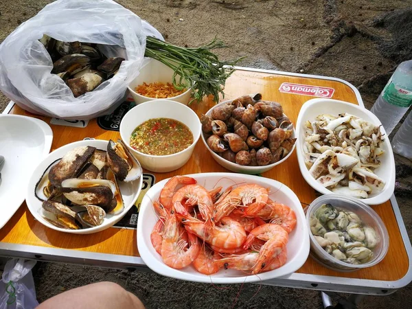 seafood barbecue on beach in Thailand