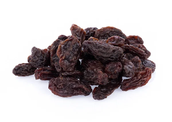 Raisins secs sur fond blanc — Photo