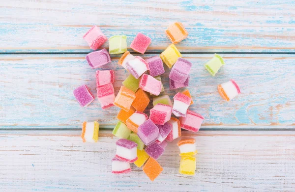 Closeup colorful candy and jelly sweet on wooden — Stock Photo, Image