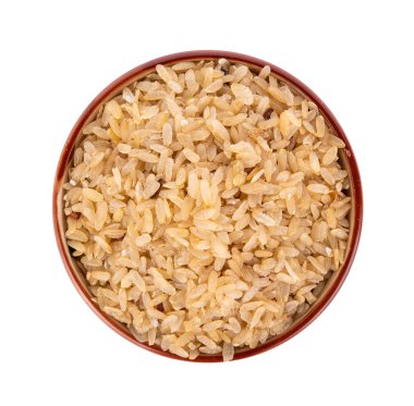 beyaz arka plan üzerinde kase içinde dövülmemiş pirinç