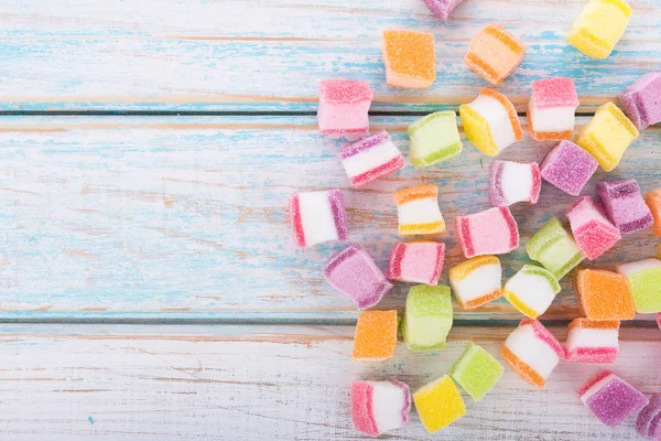 Closeup colorful candy and jelly sweet on wooden — Stock Photo, Image