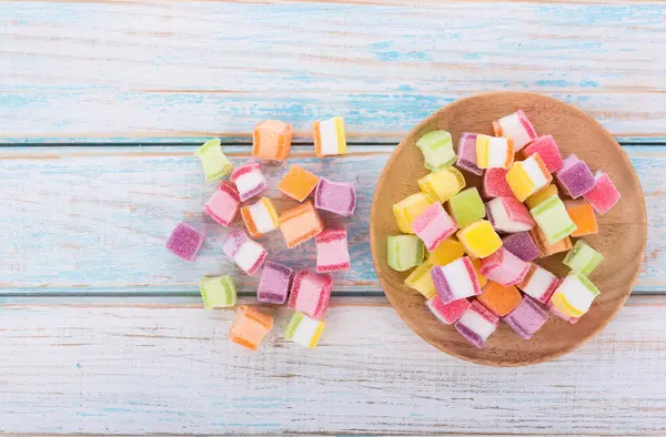 Closeup colorful candy and jelly sweet on wooden — Stock Photo, Image