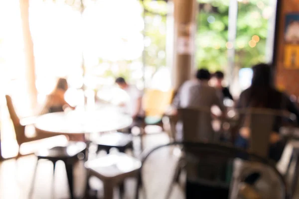 Verschwommener Hintergrund von Restaurant mit Menschen — Stockfoto