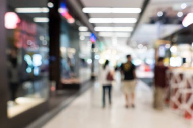 Alışveriş merkezi veya sergi salonu ve arka plan kullanımı için insanlar bulanık görüntü