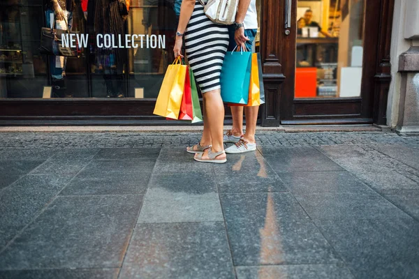 love couple with bright shopping bags