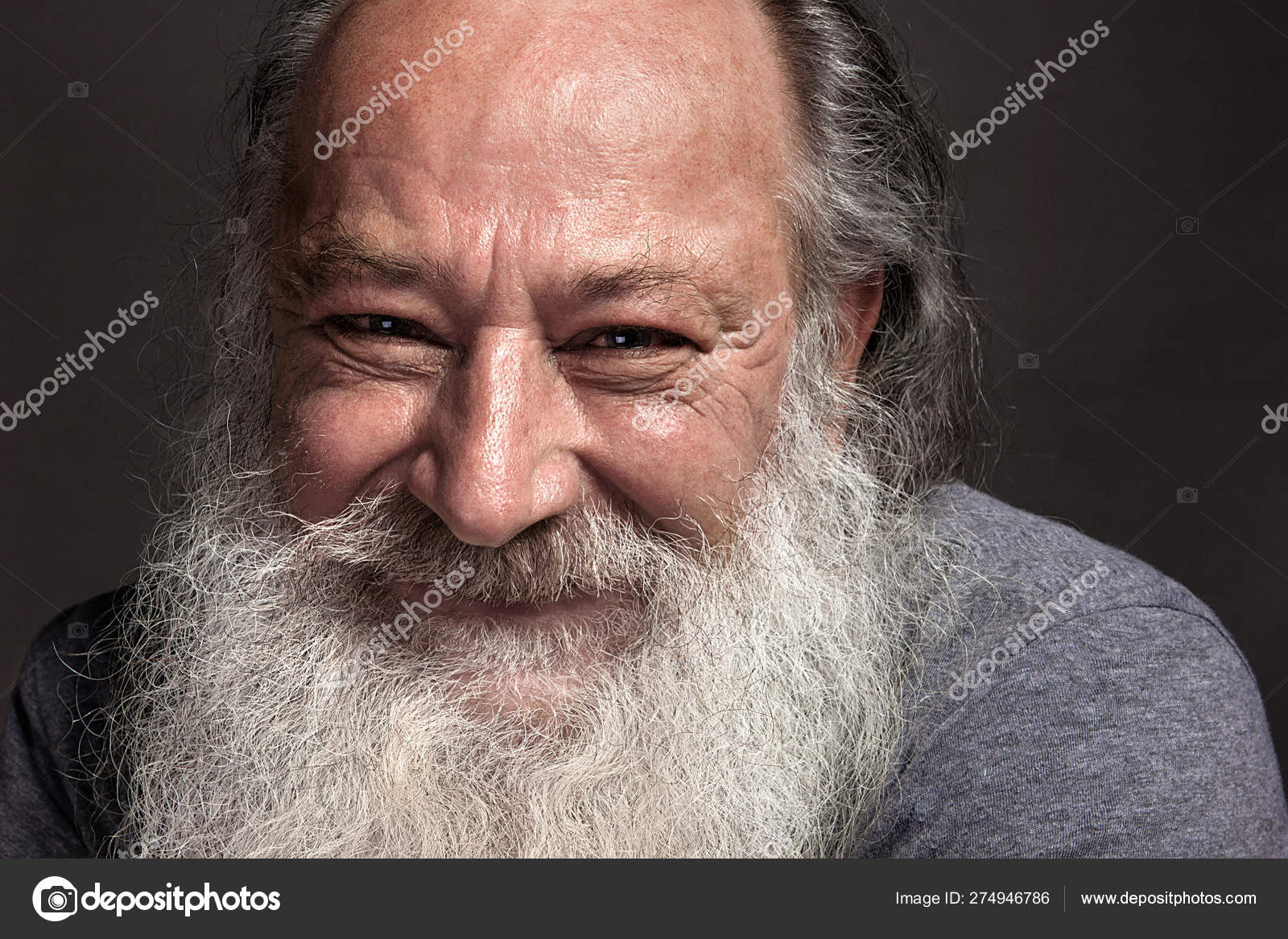 A Gray Haired Old Man Of Sixty Seventy With Long Gray Hair
