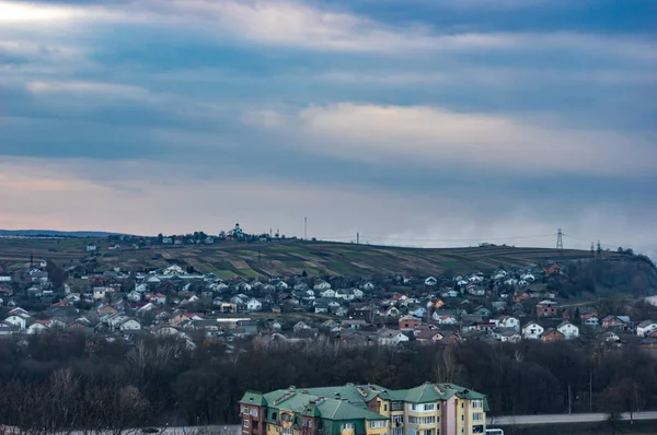 Panorama of a small European town at sunset — Stock Photo, Image