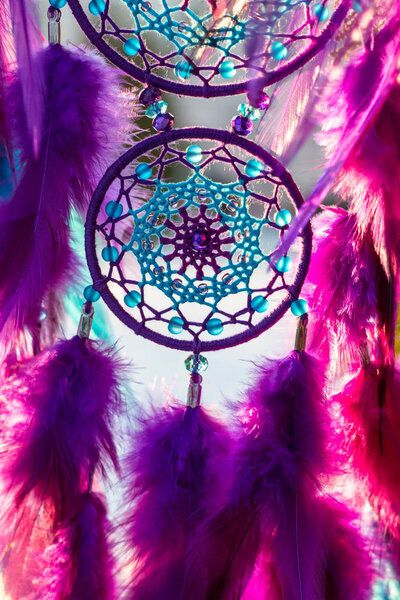 Dream catcher with feathers threads and beads rope hanging. Dreamcatcher handmade