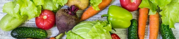 Banner of Different colorful vegetables all over the table in full frame. Healthy eating