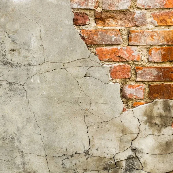 Background of old vintage brick wall with concrete,Weathered texture of racked concrete vintage brick wall background