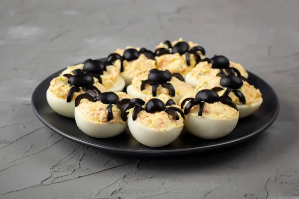 Deviled Eggs With A Spider For Halloween Party. Fun food for kids.