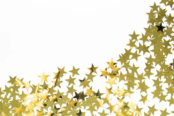 金の星のコンフェッティとクリスマスコーナー コピースペース付きホワイトで新年のための休日の背景 — ストック写真