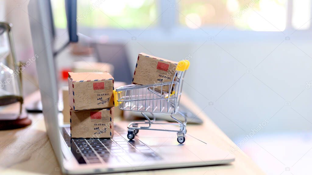 Online shopping and home delivery concept. Lock down and Self-quarantine for work home. SME business and e-commerce effect from Covid-19.