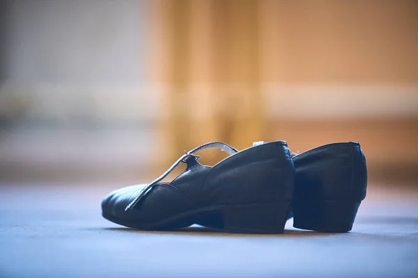 dance shoes standing on the floor in the hall