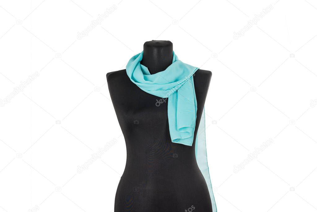 Scarf, shawl on a black mannequin. Isolated
