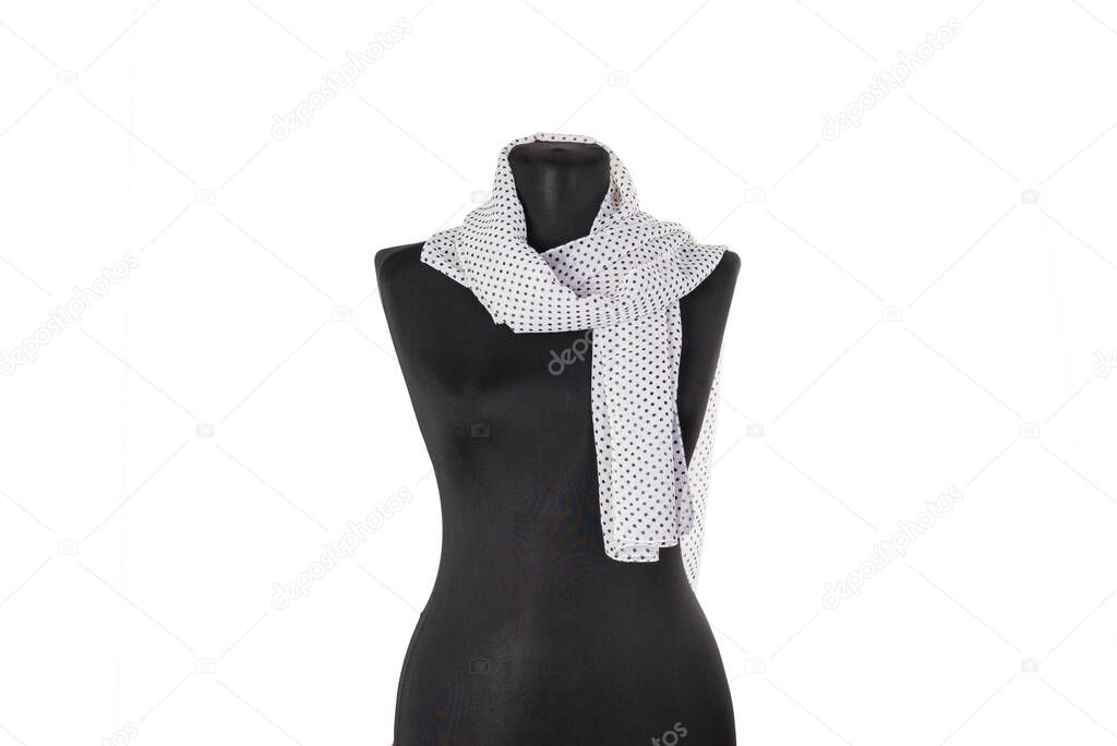 Scarf, shawl on a black mannequin. Isolated