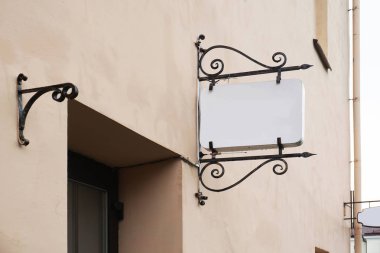 Tabela metni ve logo için boşluk duvar üzerinde asılı vintage.