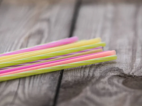 Plastic free concept, plastic straws on wooden background