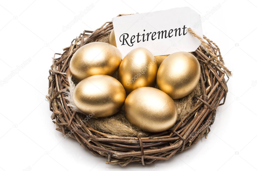 Nest with golden eggs with a tag and a word retirement on a white background. The concept of successful retirement