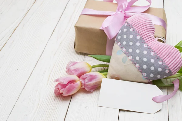 Beautiful tulips with gift box. happy mothers day, romantic still life, fresh flowers. Stock Image