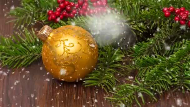 Christmas wooden table with New Year and Christmas decorations and beautiful snowfall, the concept of New Years advertising and animated New Year card — Stock Video