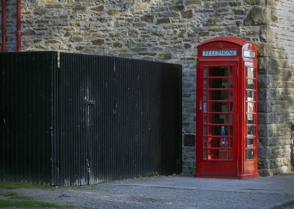 Red British phone box now being phased out but still around in remote villages around the UK