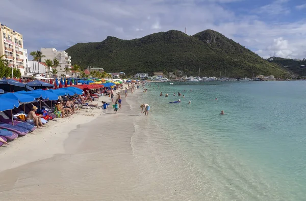 Editorial St Maarten, Caribbean - January 14, 2019: Holiday makers on a beach on the island of St.Maarten in the Caribbean