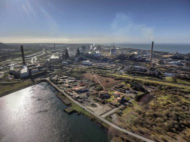 Editorial Port Talbot, UK - March 23, 2019: Port Talbot Steel Works prior to a merger between Tata Steel and Thyssenkrupp which will create Europe's second-biggest steelmaker. clipart