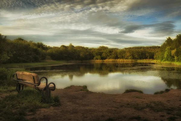 The lower lake at Penllergare woods, started in 1838, John Dillwyn Llewelyn created two lakes and two waterfalls in the valley as part of his grand design for Penllergare woods in Swansea, South Wales, UK