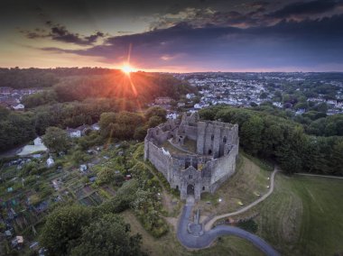 Editorial Swansea, UK - July 14, 2019: Sunset at Oystermouth Castle, a Norman stone castle in South Wales overlooking Swansea Bay on the east side of the Gower Peninsula near the village of the Mumbles. clipart