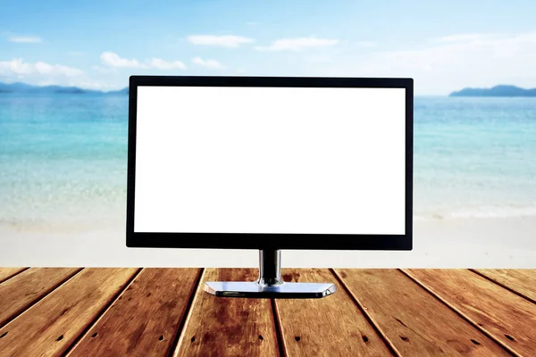 blank monitor for your advertisement design on wooden table