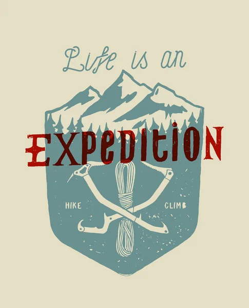 Life is an expedition - Crossed ice axes and the rope in front of the mountains - typography and mountains t-shirt print — Stock Vector