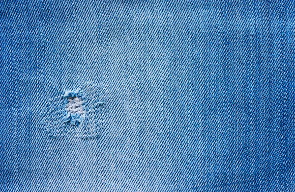 Fundo Textura Tecido Azul Denim Com Remendo Buraco — Fotografia de Stock