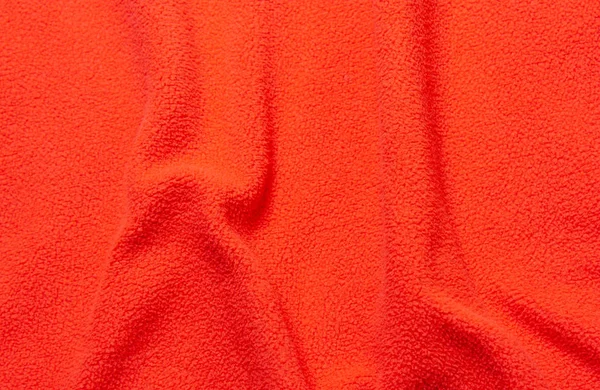 红色柔软的羊毛纹理 泰迪皱巴巴的超细纤维地毯的表面 — 图库照片