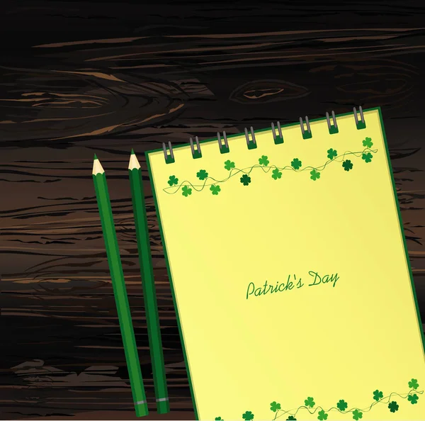 Cuaderno con plantilla dibujada a mano Bunting festivo verde con trébol y lápiz. Fiesta irlandesa - Feliz Día de San Patricio con una guirnalda de tres hojas. Vector sobre fondo de madera — Vector de stock