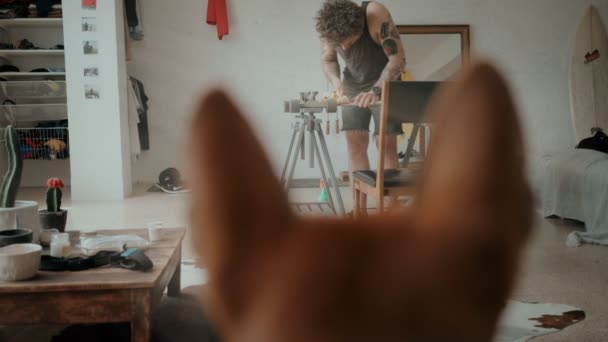 Skateboarder regrips board diy at workshop — Stock Footage Skateboarder regrips board diy at workshop Royalty Free Stock Video
